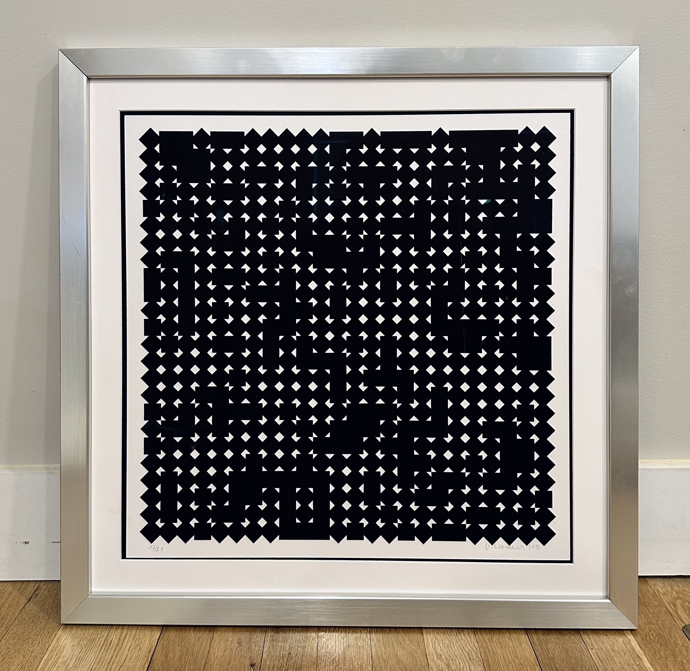 The print of Carrés en deux positons 4 (2011-2013) by Vera Molnar which inspired this collection. (Photo by Maxwell White, 2023).